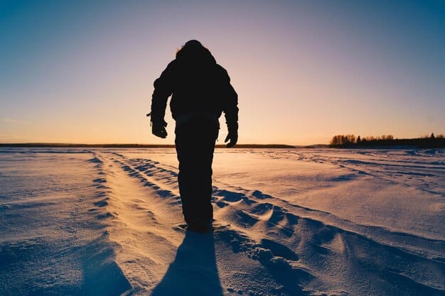 A stark, wintery landscape in Iceland, with a lone figure walking towards a remote police station. The scene is shrouded in fog and snow, creating a sense of isolation and foreboding, characteristic of Nordic Noir crime dramas. The image emphasizes the atmospheric and unsettling quality of the genre.