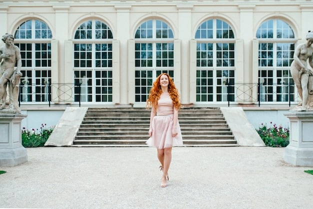 High-angle shot of the Palace of Versailles, showcasing its symmetrical gardens, grand facade, and the Hall of Mirrors reflecting light. The image highlights the palace's opulence and historical importance.