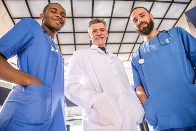 A hopeful image showing a group of real-life doctors smiling and supporting each other in a break room. The image emphasizes teamwork and the importance of a supportive work environment in combating burnout.
