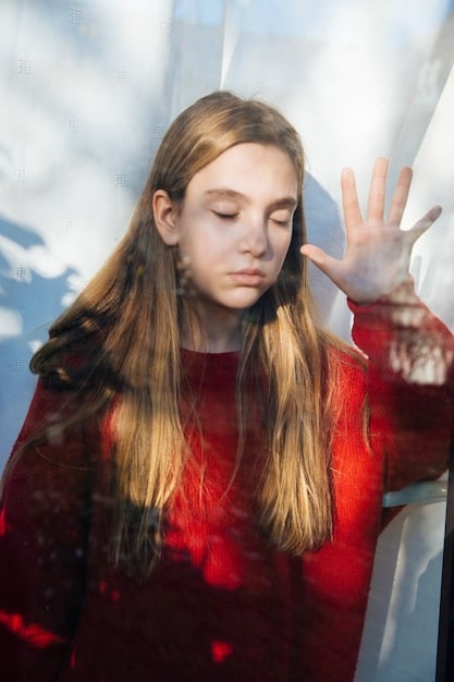 A close-up shot of a teenager's face, showing a mix of emotions - anxiety, hope, and determination. The background is blurred, emphasizing the character's internal struggles.