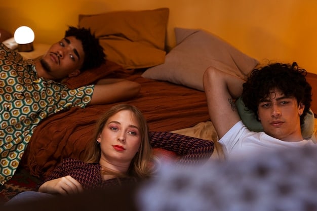 A still image from a popular teen drama, showing a group of friends huddled together, looking concerned and supportive. The scene is set in a dimly lit room, creating a sense of intimacy and drama.