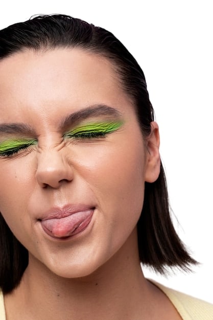 A close-up of a teenage character from 