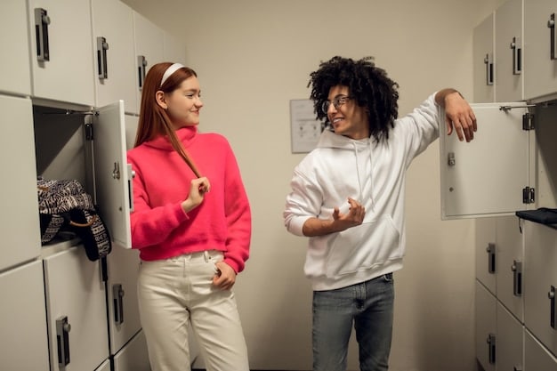 Two friends sharing a moment of vulnerability by lockers at school.