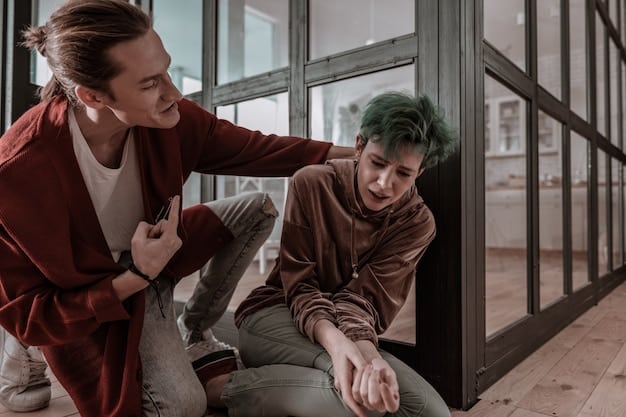 A scene from a popular teen drama, showing two main characters in a vulnerable and emotional conversation in a school hallway, highlighting the intense relationships and personal struggles.